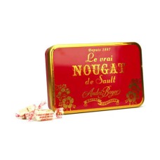 Einzelner weißer Nougat in Metallbox