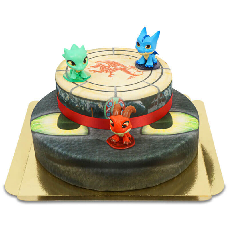 Drachen auf abgestuftem Kuchen mit Schleife