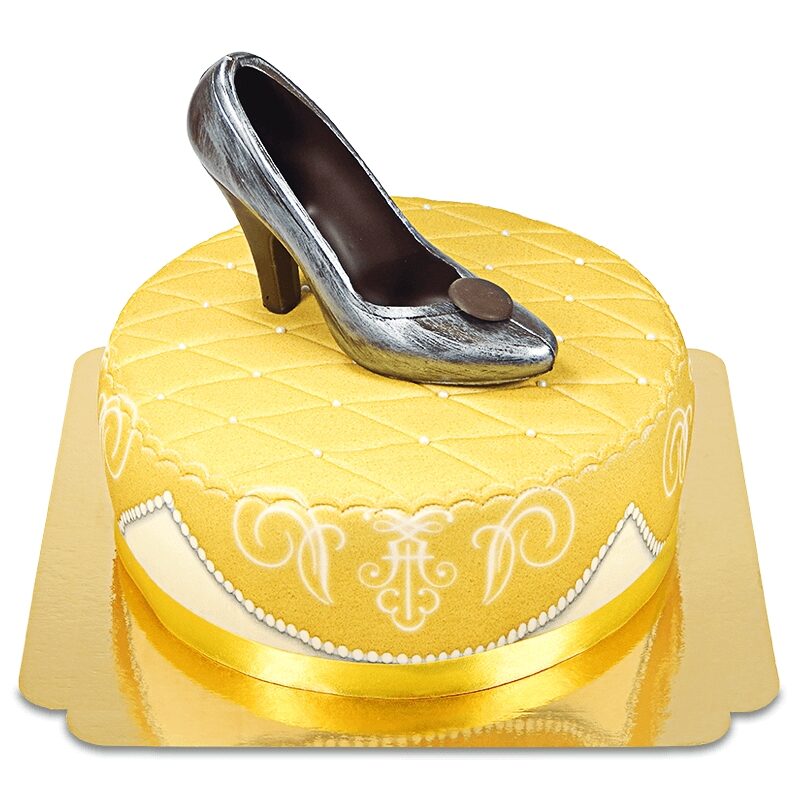 Goldener Deluxe-Kuchen mit Schokoladenschuh und Band