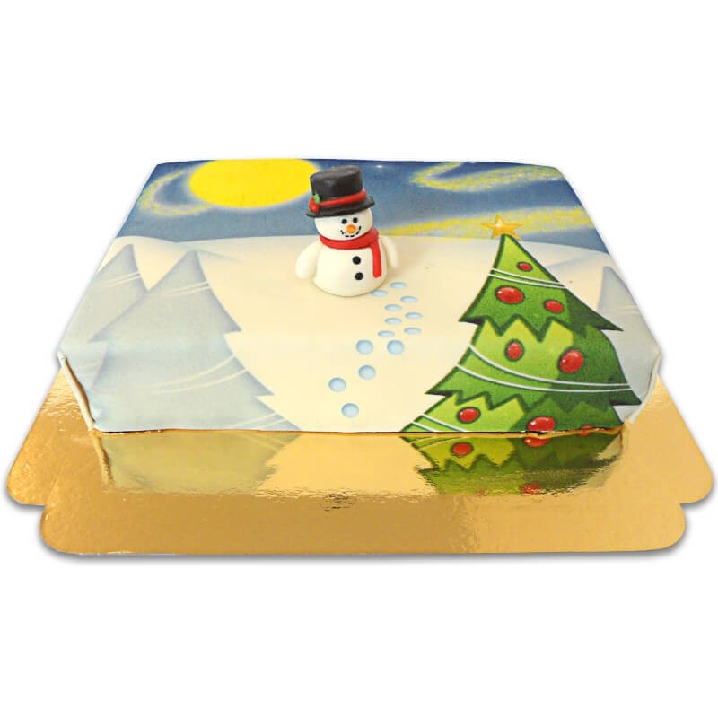 Zuckerschneemann auf einem Winterlandschaftskuchen